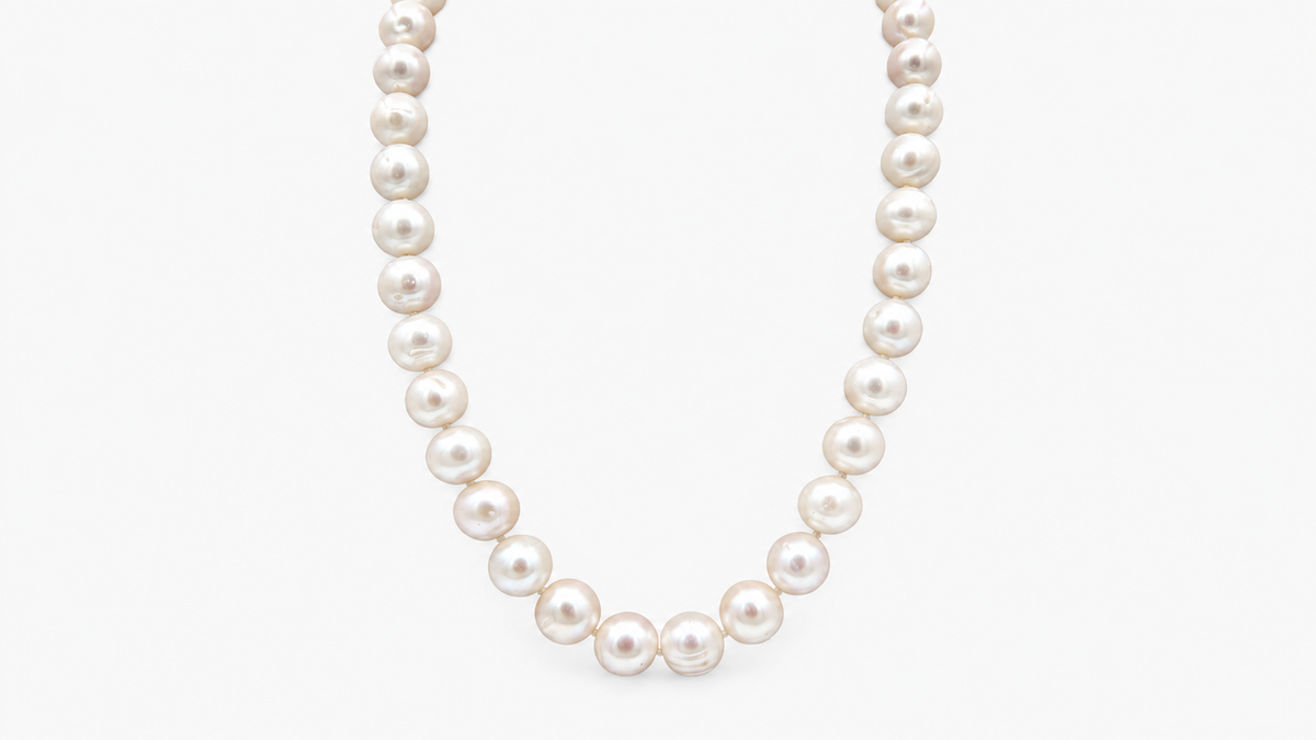 10–11mm Freshwater Pearl Strand Necklace in sterling silver 925, front view on a light grey background
