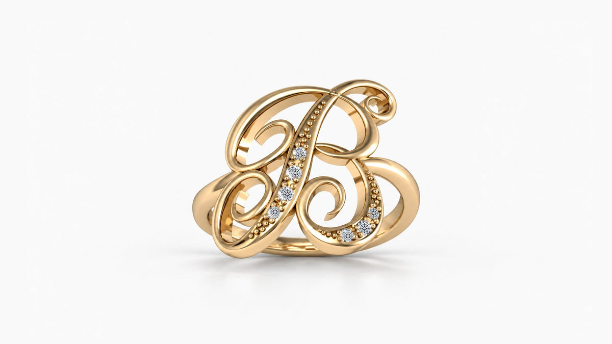 B diamond initial ring in polished yellow gold, front view