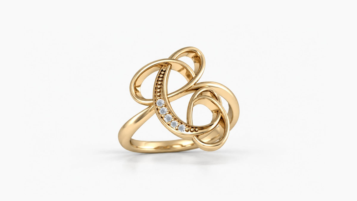 C diamond initial ring in polished yellow gold, front view