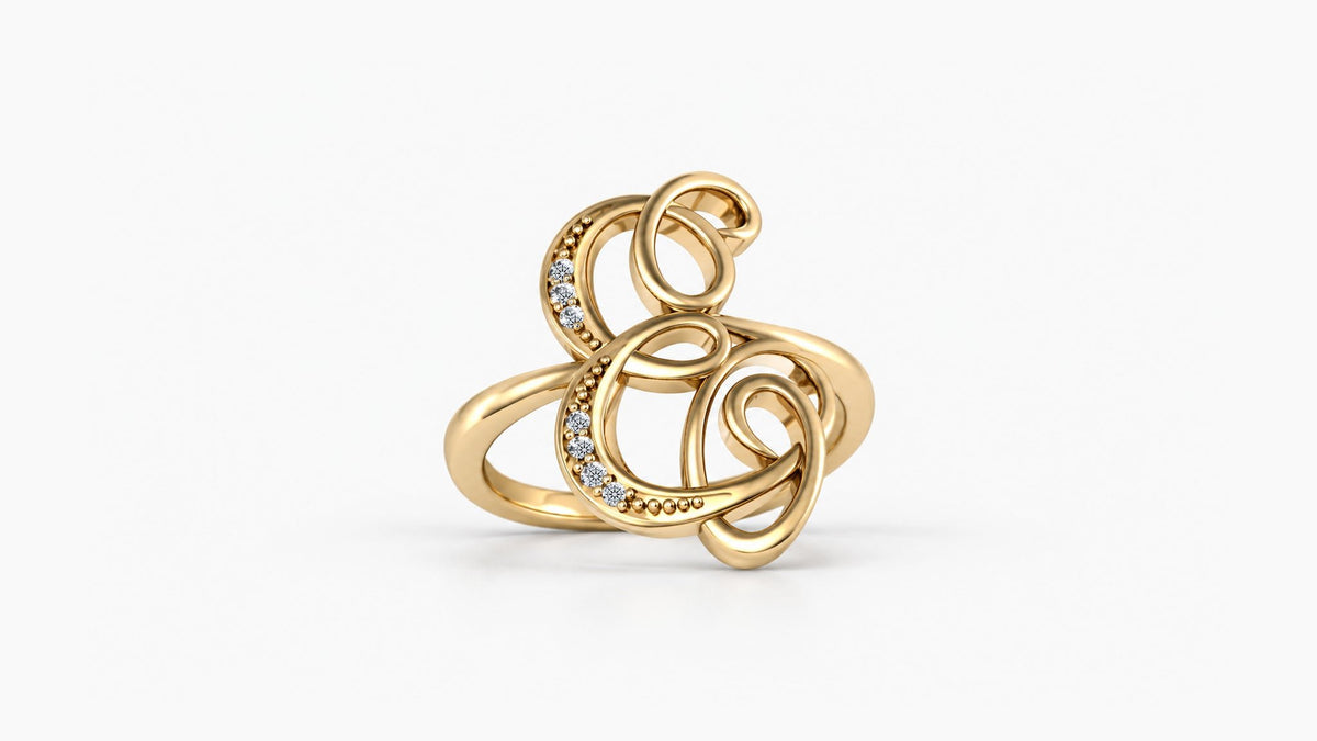 E diamond initial ring in polished yellow gold, front view