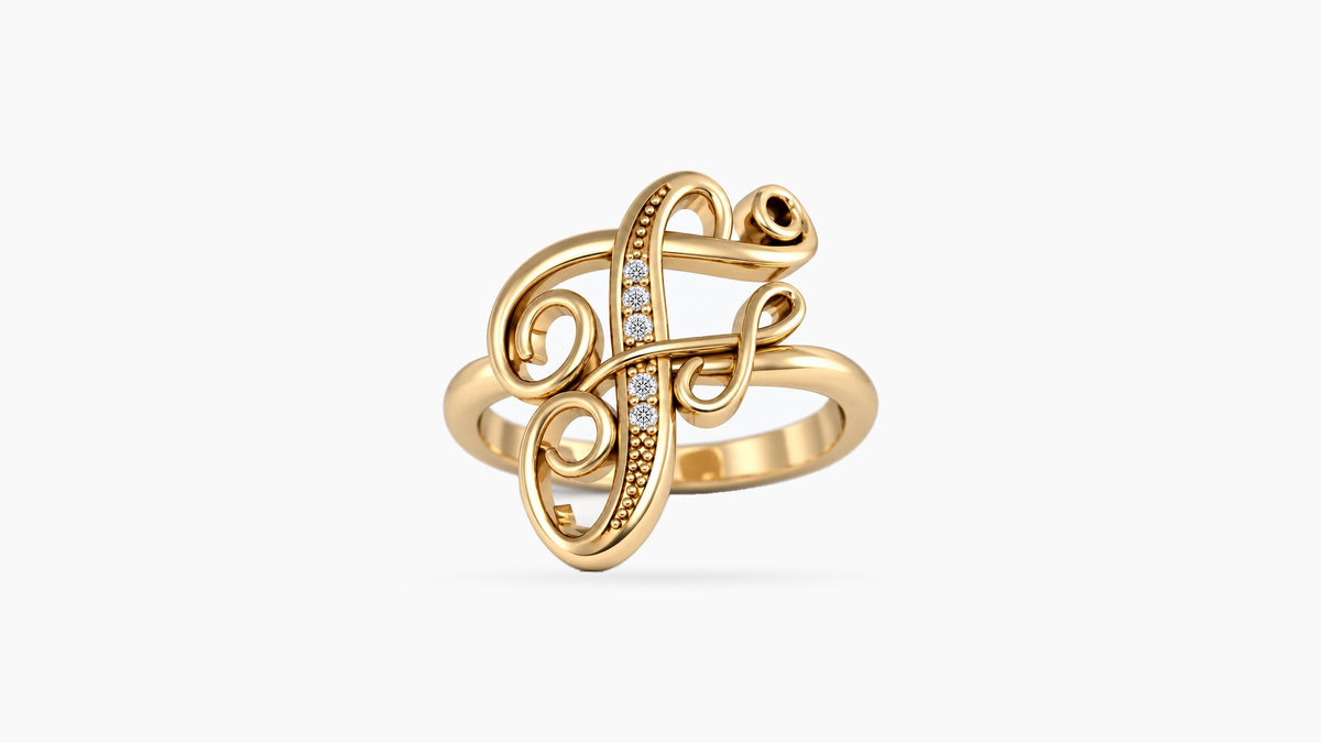 F diamond initial ring in polished yellow gold, front view