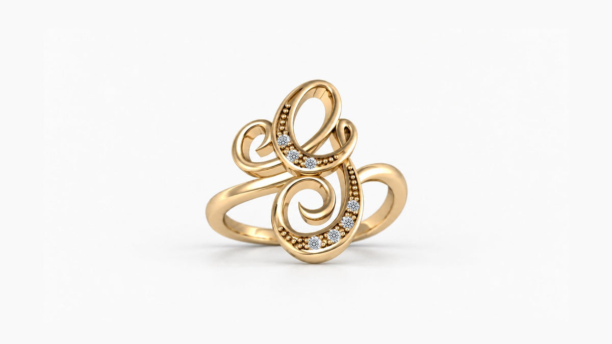 G diamond initial ring in polished yellow gold, front view