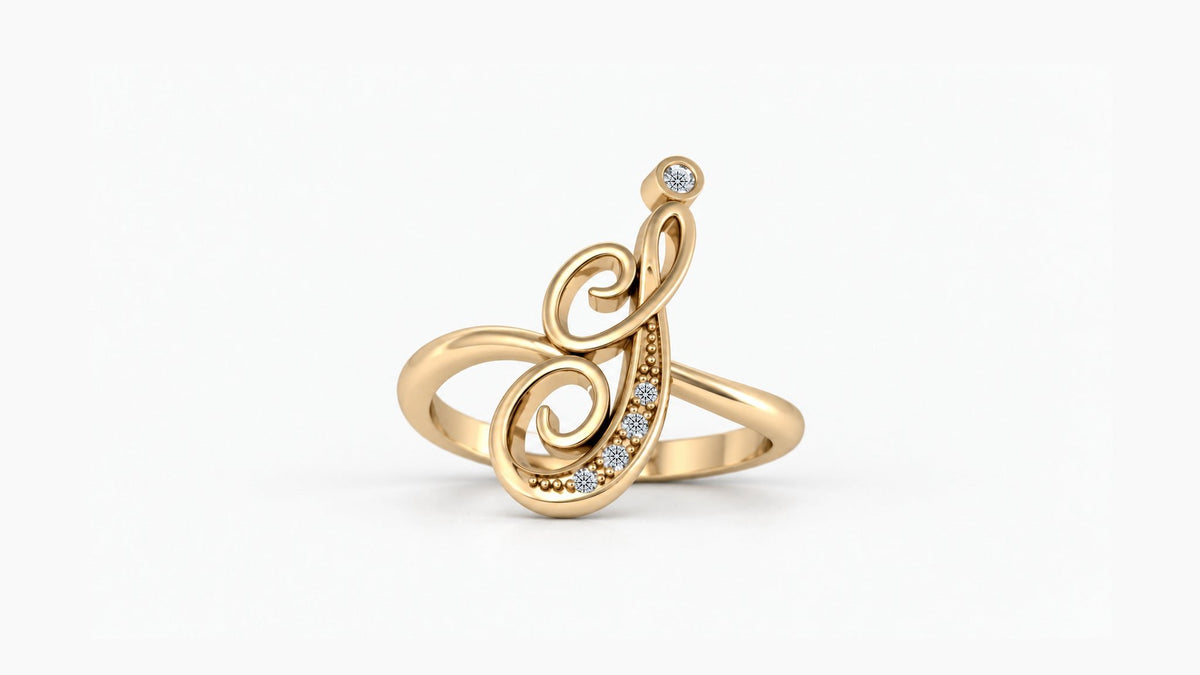 I diamond initial ring in polished yellow gold, front view