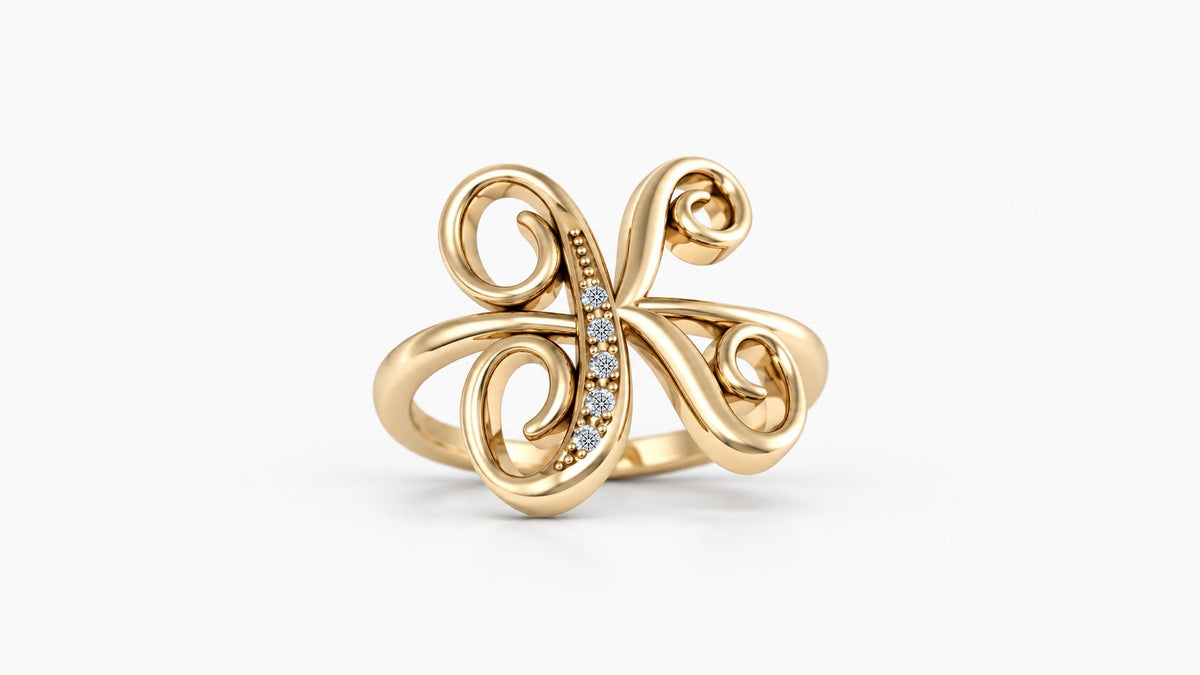 K diamond initial ring in polished yellow gold, front view