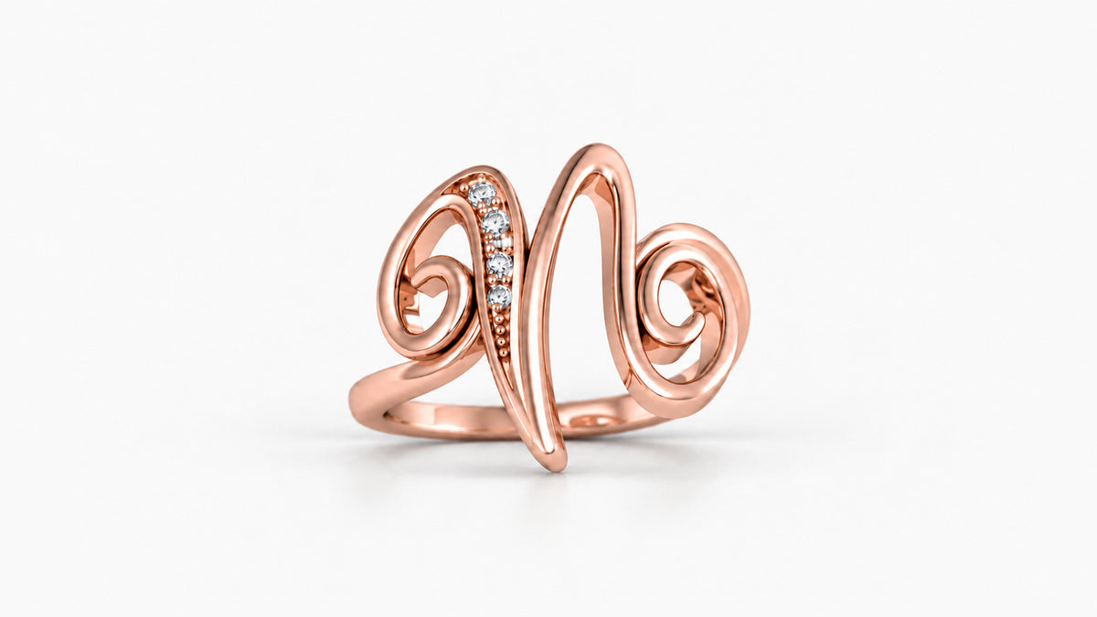 N diamond initial ring in polished rose gold, front view