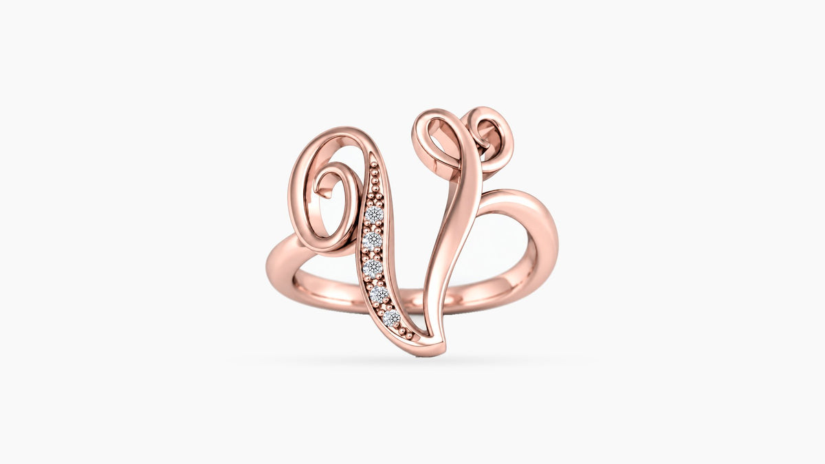V diamond initial ring in polished rose gold, front view
