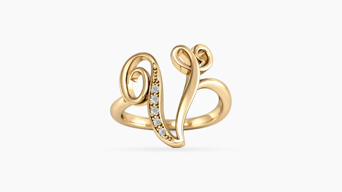 V diamond initial ring in polished yellow gold, front view