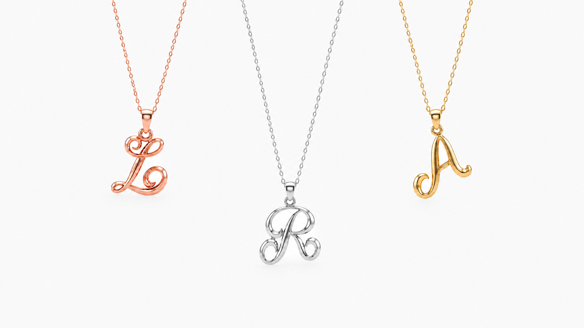 Small Cursive Initial — L in rose gold, R in white gold and A in yellow gold, grouped on fine chains